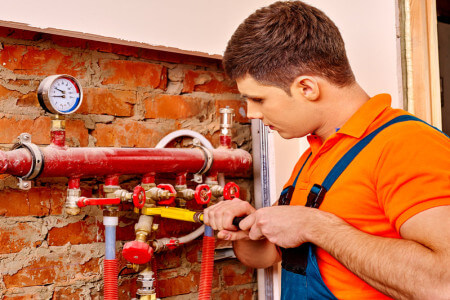 fixing heating system with special plumbing tool