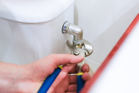 cheap plumbing professional perform repair of toilet bowl