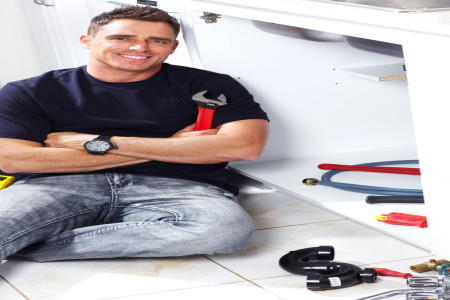 Best plumber smiling after fixing the emergency quickly