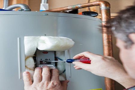 Calling Water heater maintenance service