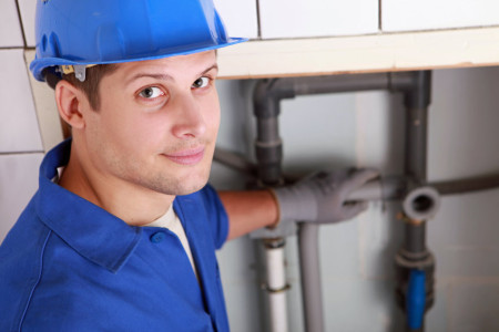 best plumber installing pipes