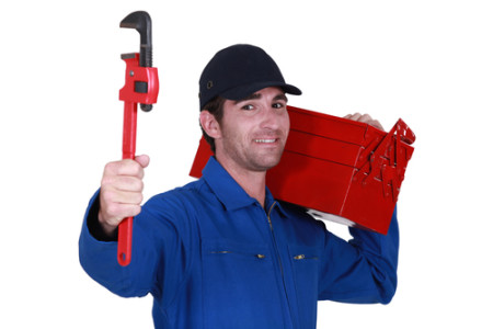 plumbing worker with a toolbox