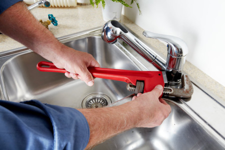 professional local plumber fixing water tap 247