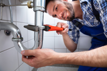 local plumber Repairing Sink In Bathroom